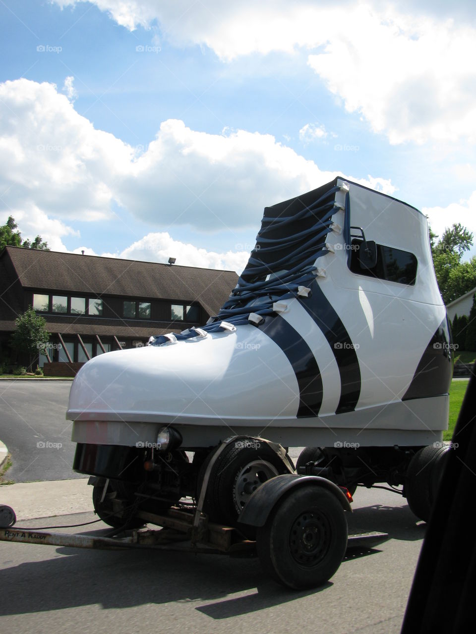 Capture this giant skate cruising down the road. 