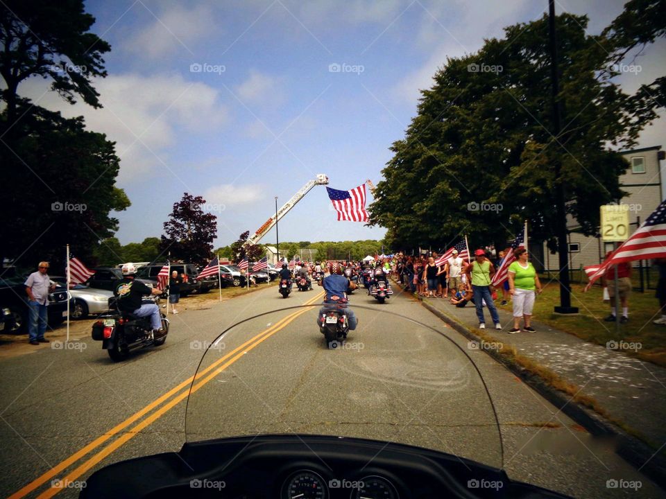 View of the American Flag 🇺🇲 and our old Colonial roads from back seat of a motorcycle ride with others.
