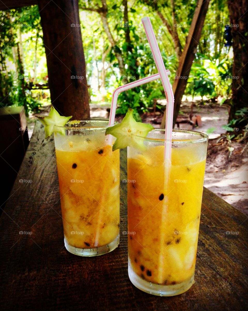 Tropical drink with passion fruit and vodka