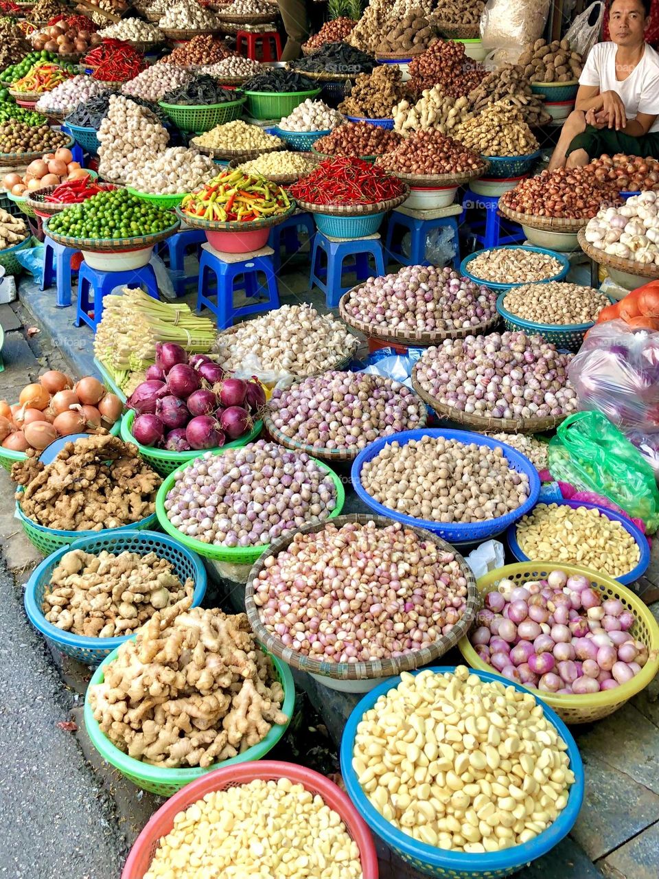 Colorful food and spices in a street market in Hanoi, Vietnam.