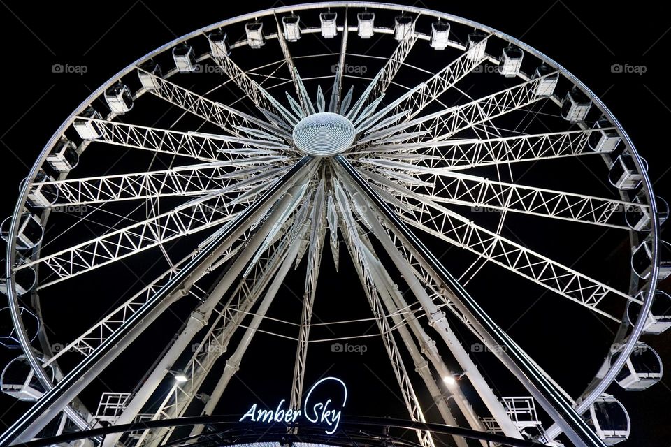 Big wheel lit up at night … circle mission 