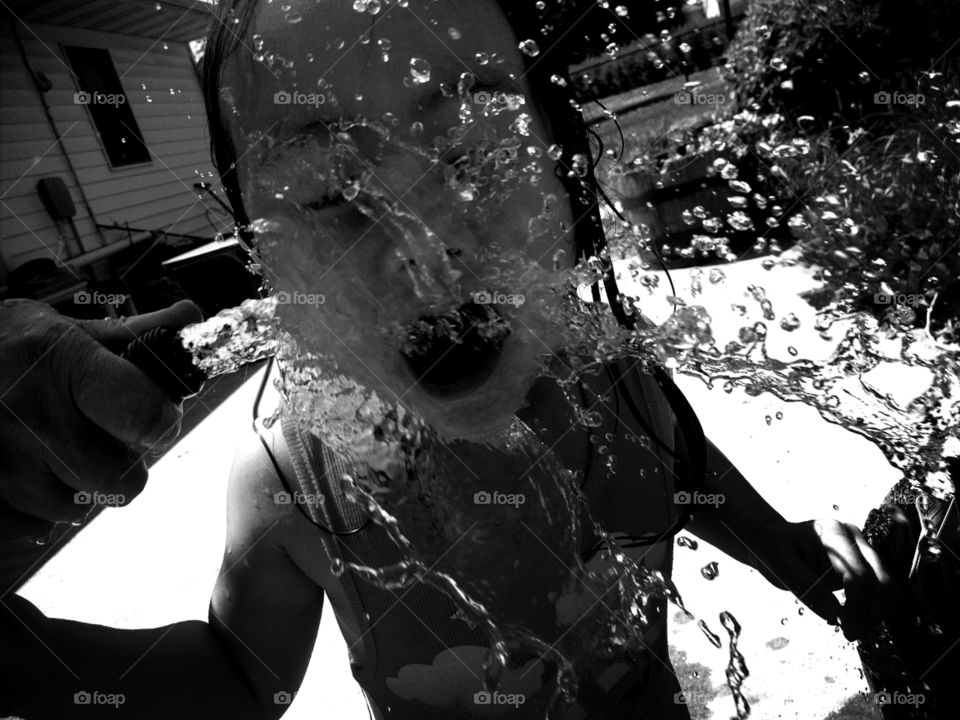 Kylie playing with the garden