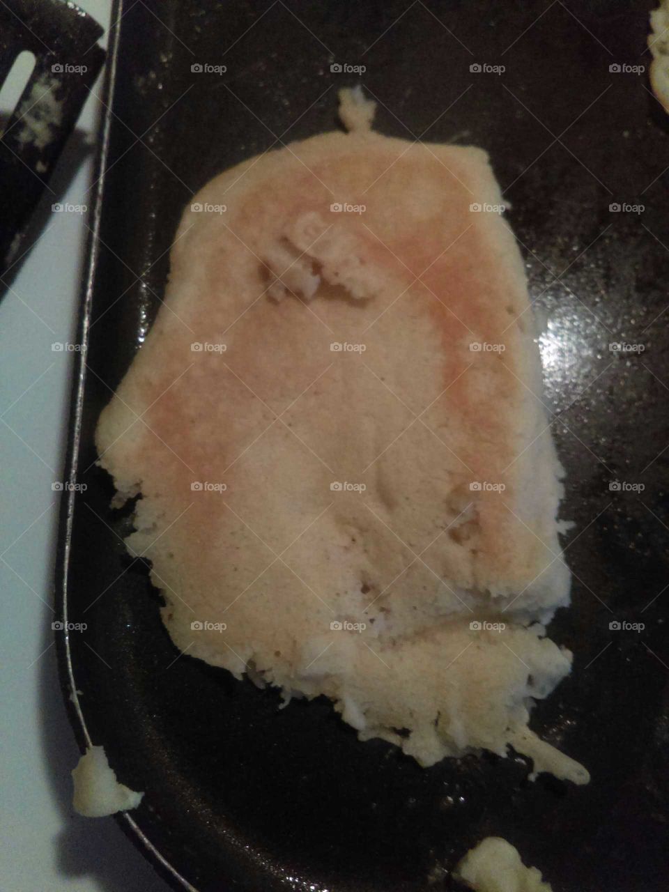 my pancake looks like a face of a man