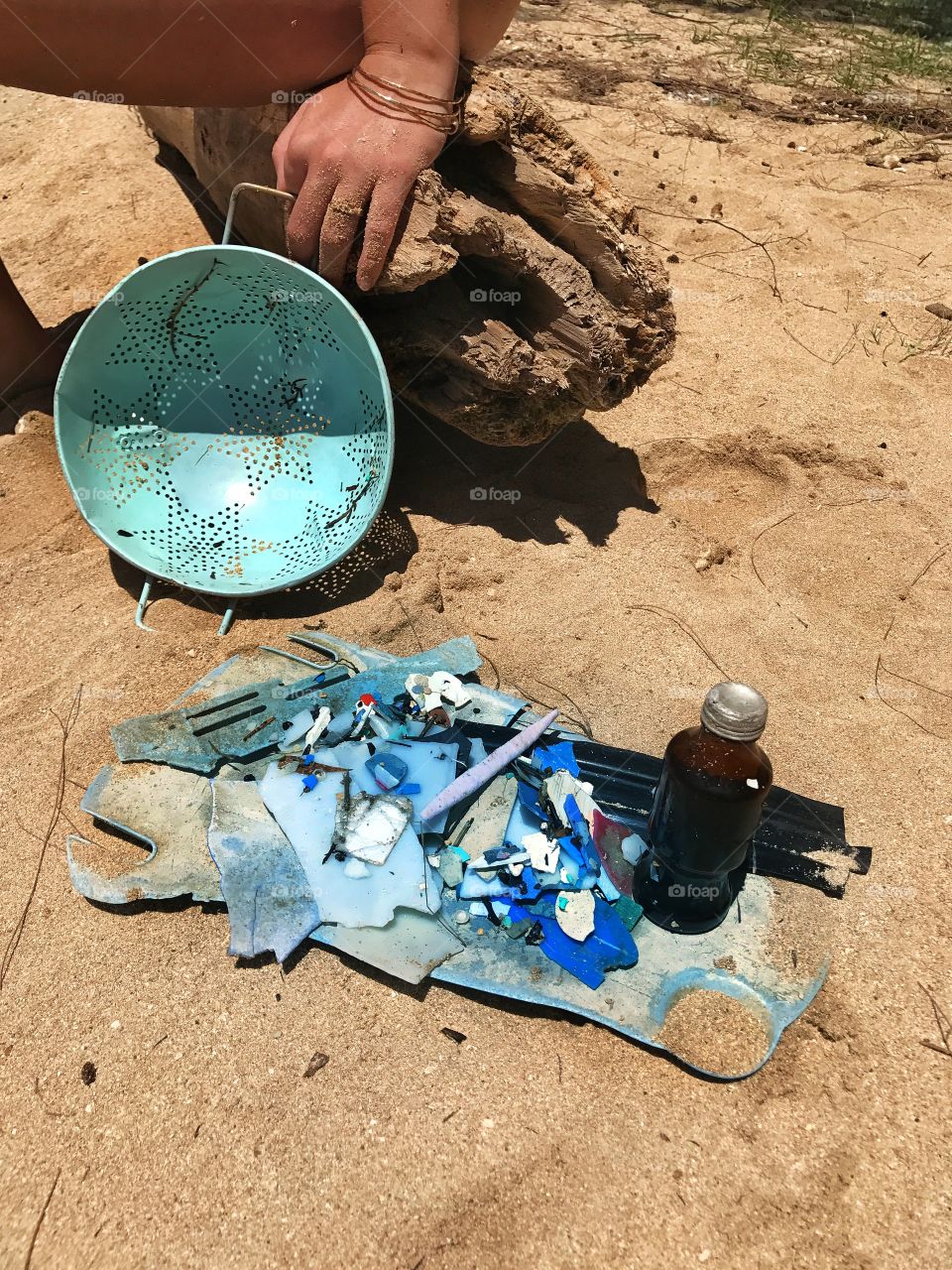 Micro-plastic pollution collected on the beautiful beaches of Hawaii using a strainer 