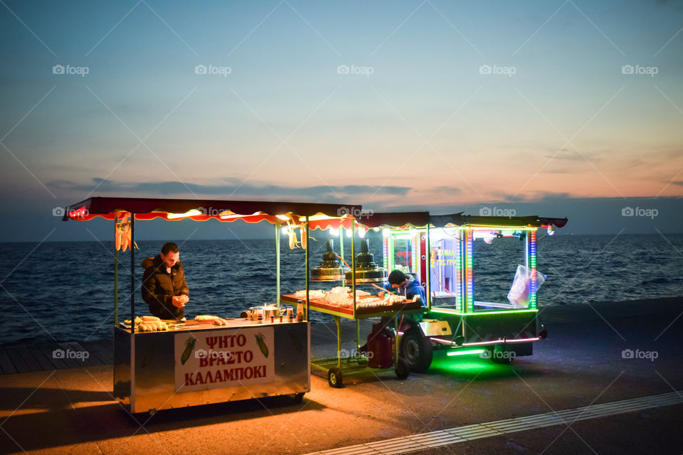 Food Street Corn And Nuts Vendors Business Owners At Sunset