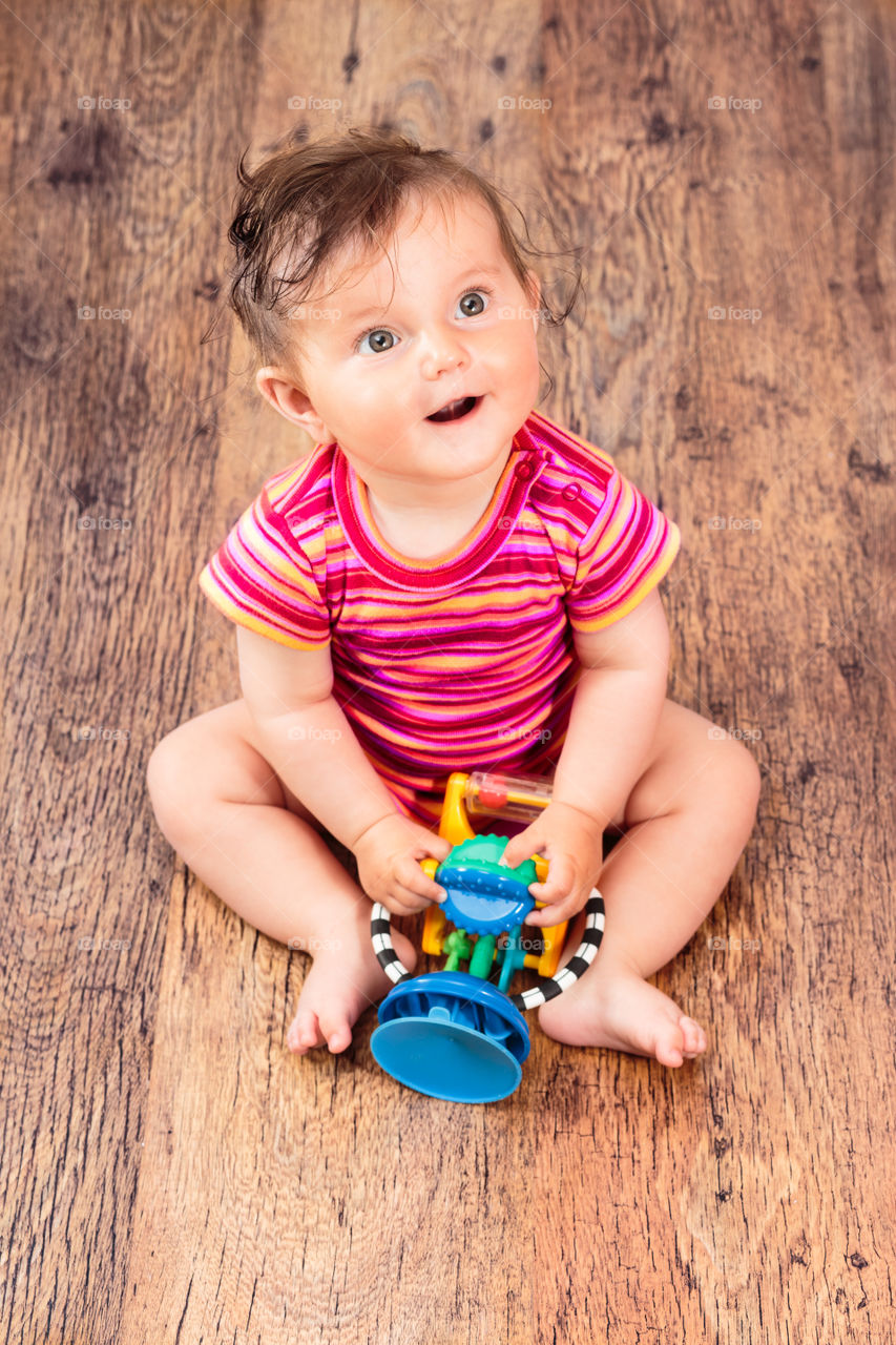 Baby playing on the floor