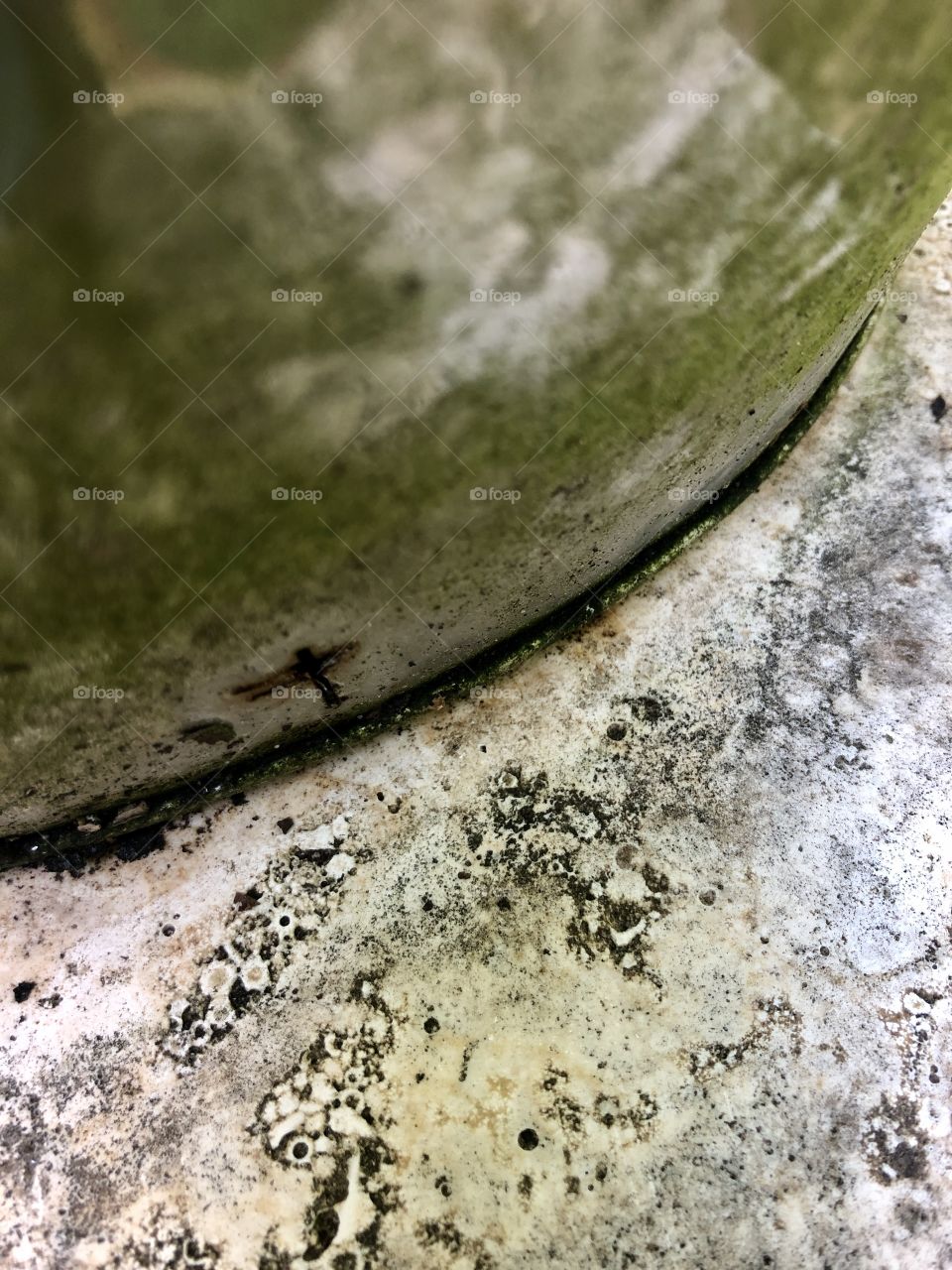 Hammered metal tub on granite surface 