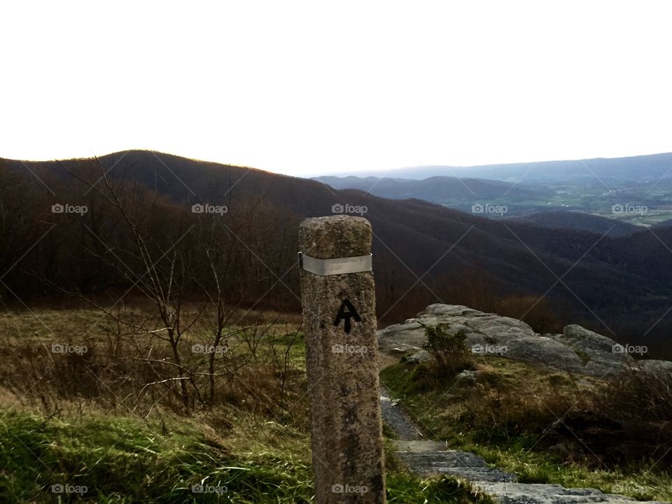 Hit the Trail. A trail marker to the Appalachian Trail in the Blue Ridge of Virginia, USA