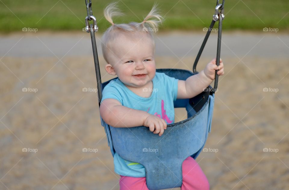 My daughter having fun on the swing!