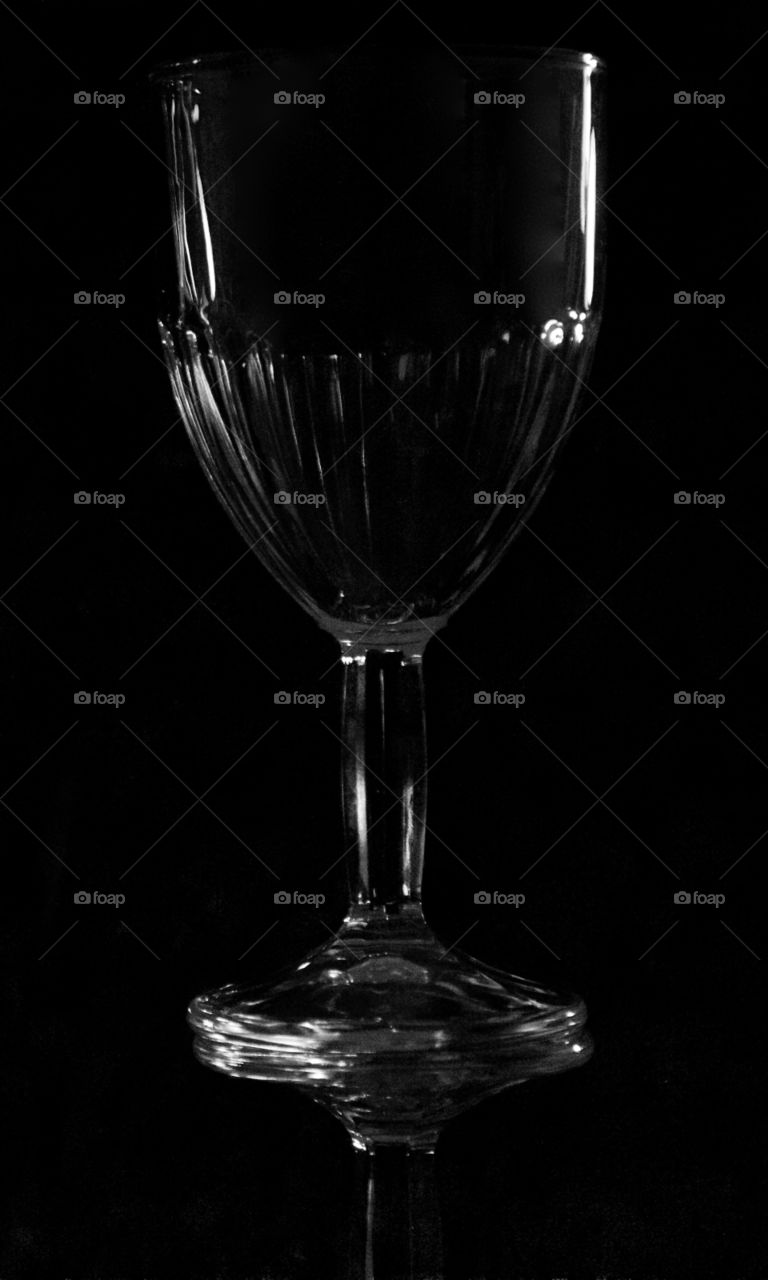 Silhouette of a glass of wine