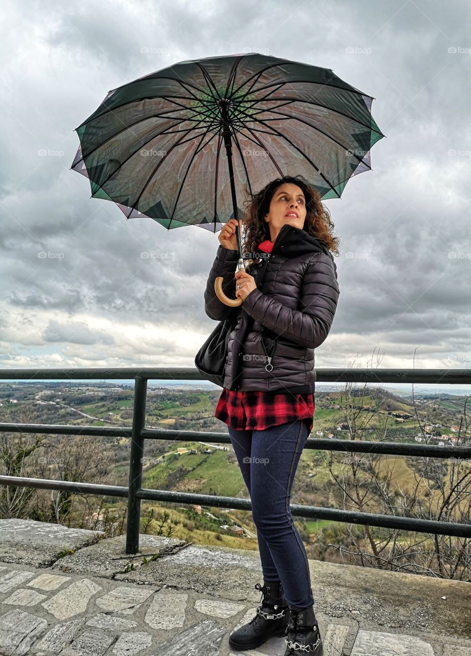 Girl in the autumn rain