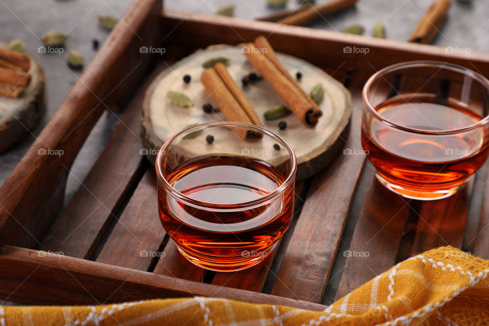 fresh green tea with cinnamon, cardamom and black pepper