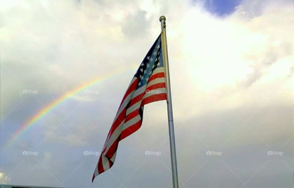 rainbow over American flag