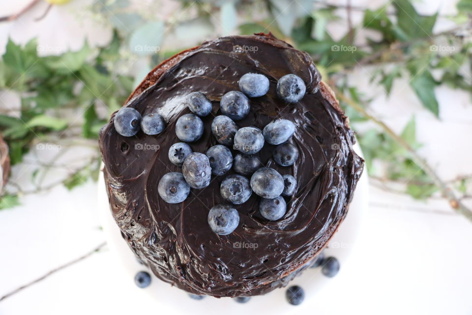 Elevated view of chocolate cake with blueberries