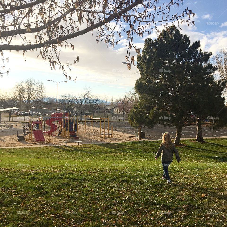 Child running to playground 