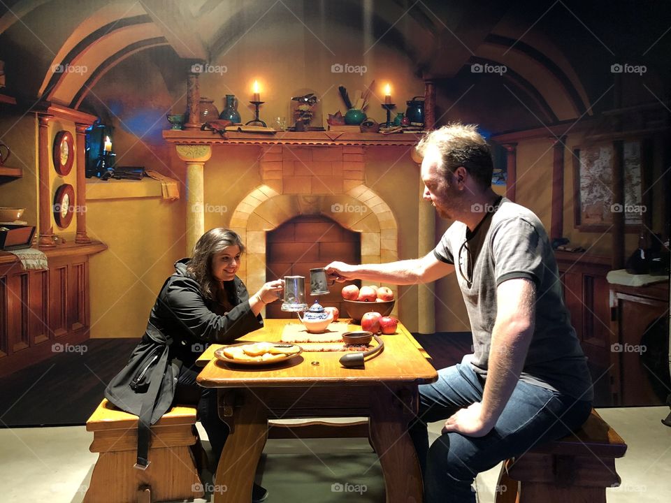 Couple with diferent perspective cheering