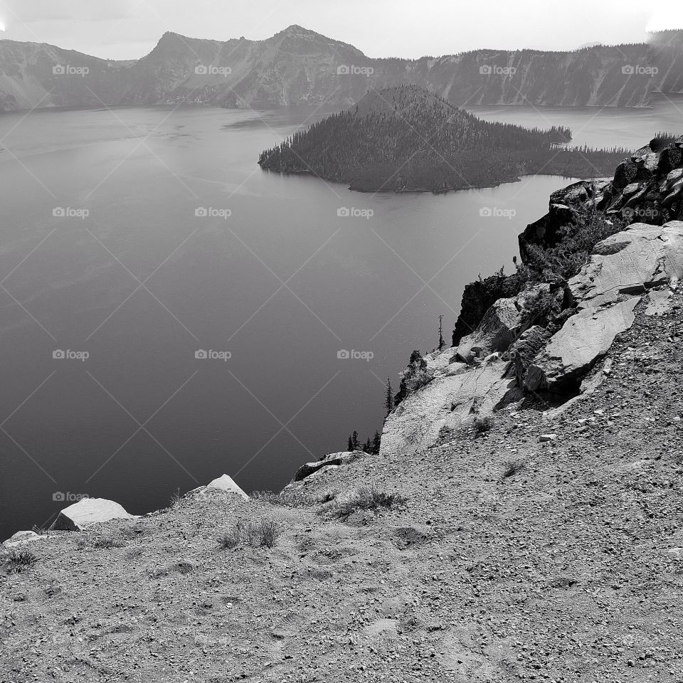 The rugged terrain of Crater Lake with a view of Wizard Island