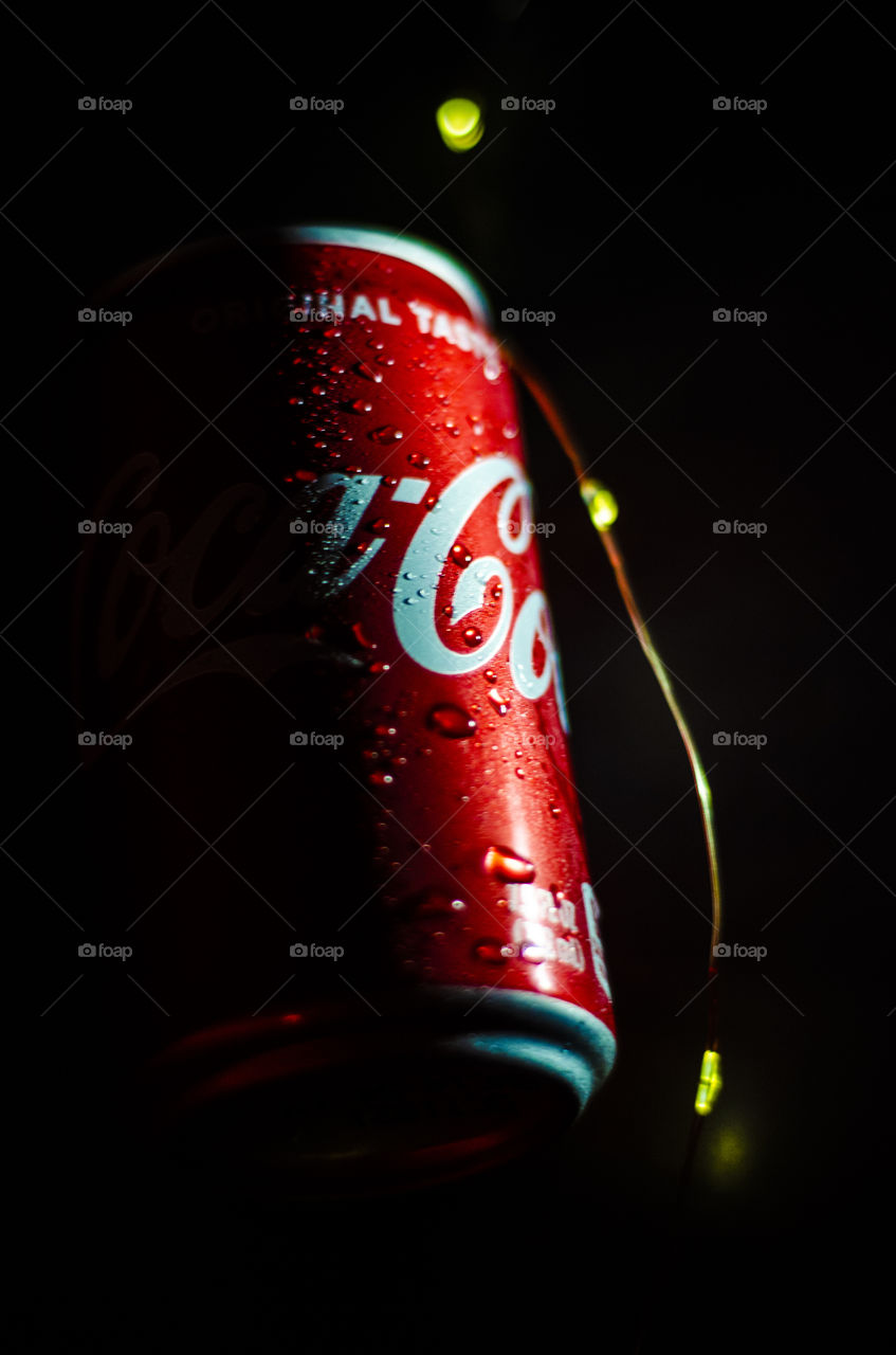 Enjoying the night with a cold can of Coca Cola!