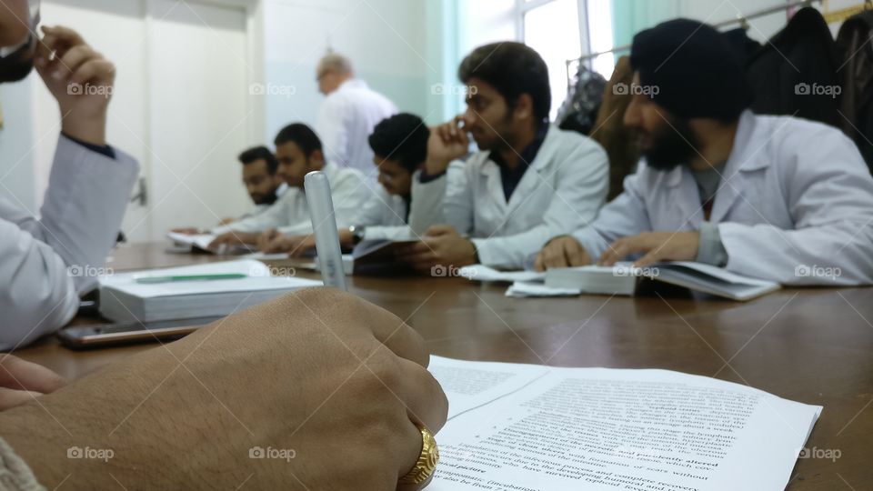 Doctors studying in a seminar