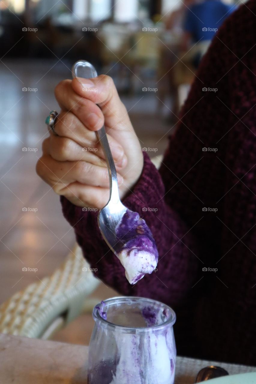 Blueberries pudding in a spoon purple color 