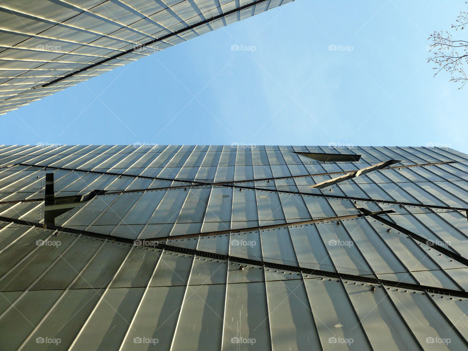 Low angle view of built structure of the Jewish Museum Berlin by day against sky.