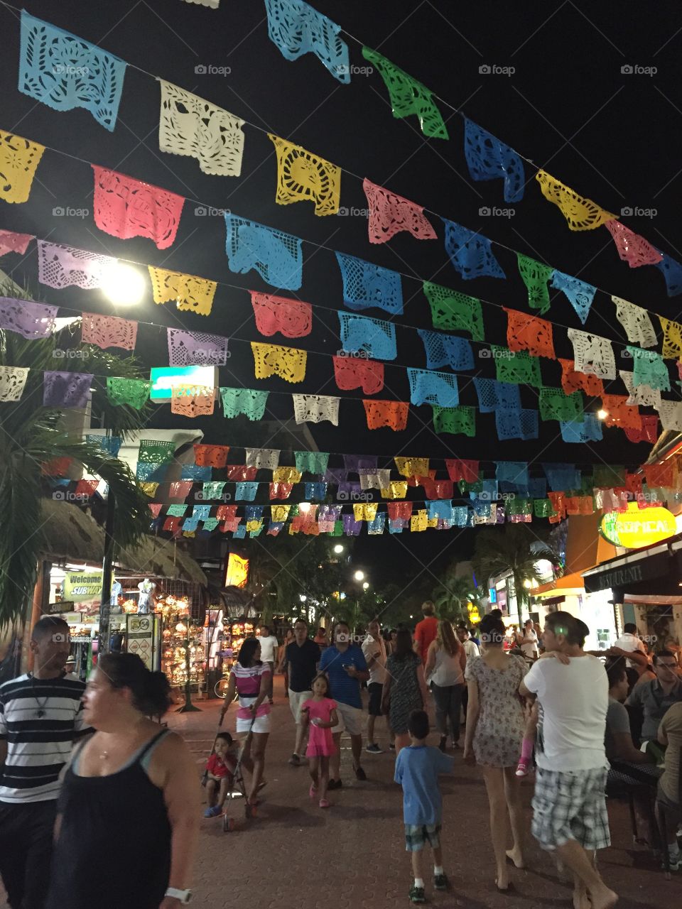 Tourism at night in Playa Del Carmen 