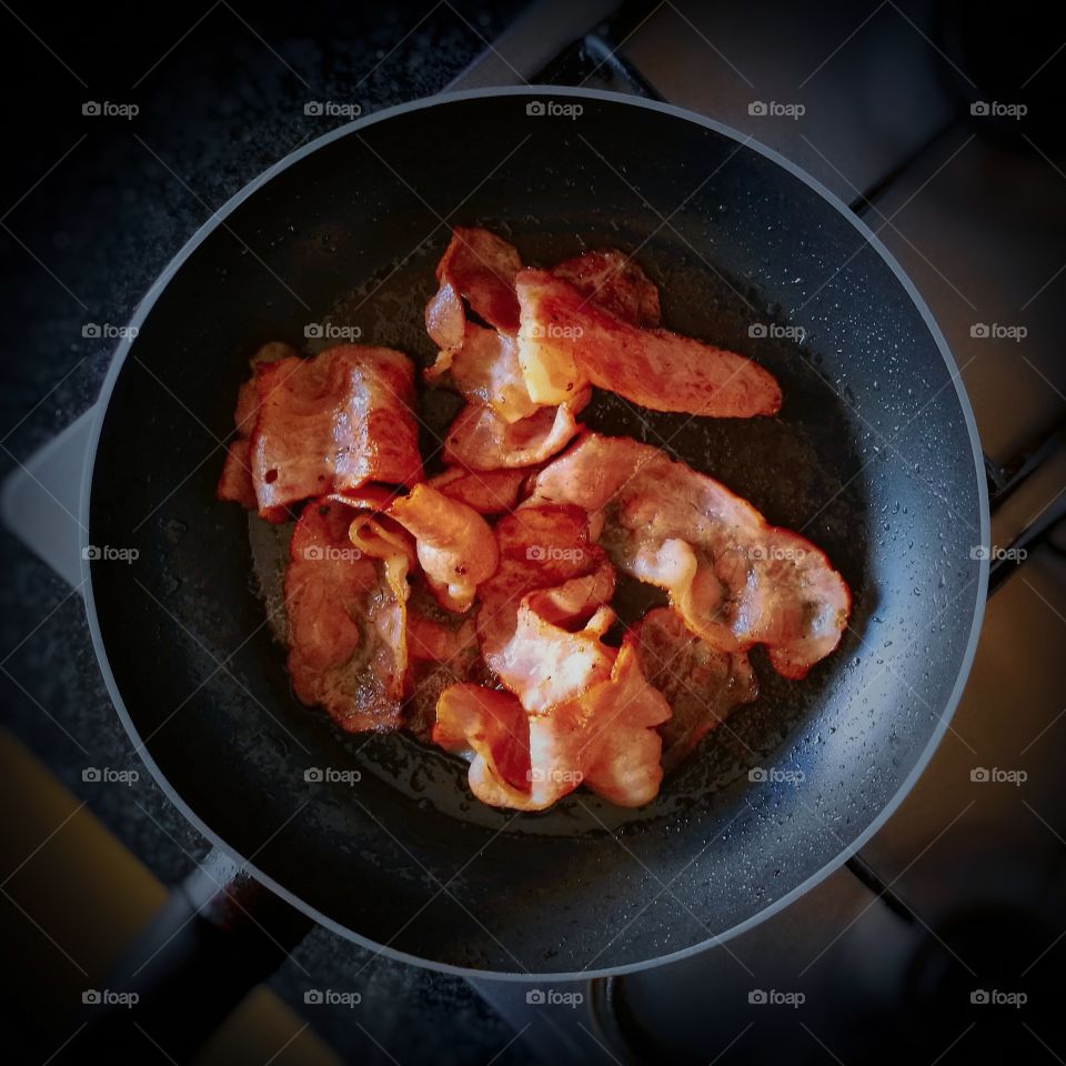 Cooked bacon in a pan