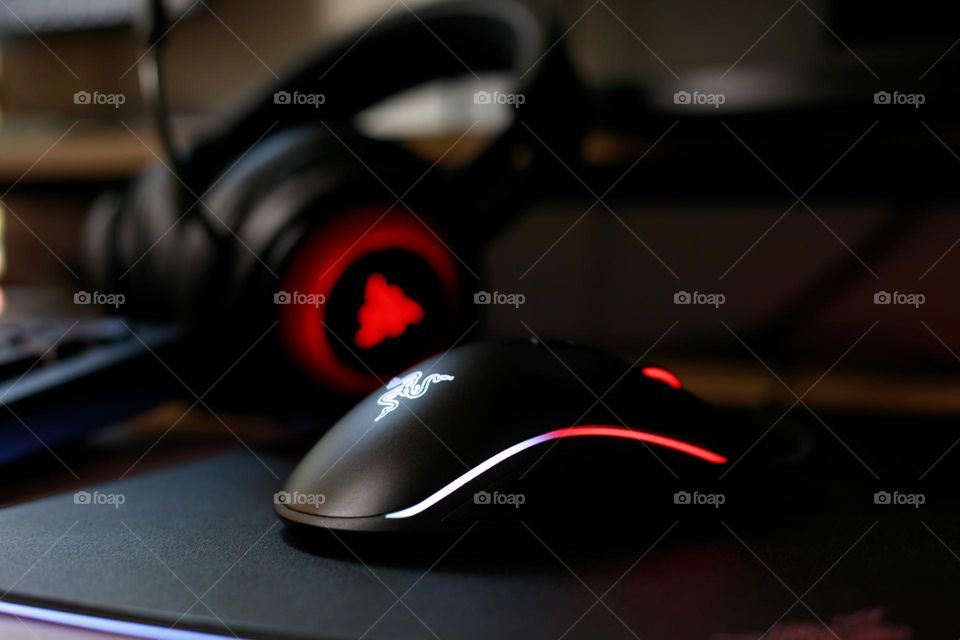 Mouse Closeup with other gaming accessories in the background 