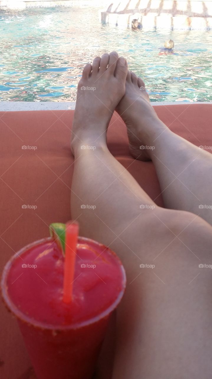 On Vacation with a glass of Strawberry- Magaritas