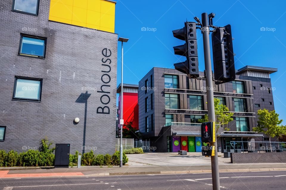 Modern office buildings against blue sky