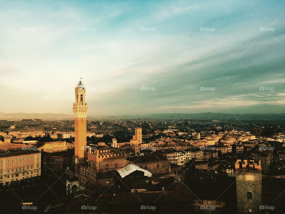 The tower and city view from the church of siena italy