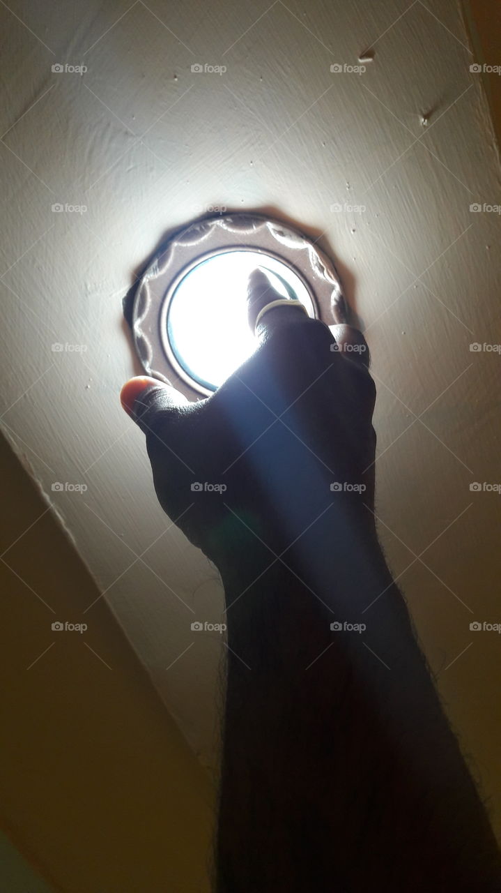 Fixing the led bulb in the socket. LED bulbs had helped in reducing electric consumption to a great level. This has also helped in reducing carbon emissions. By the help of technology we can greatly reduce Global warming.