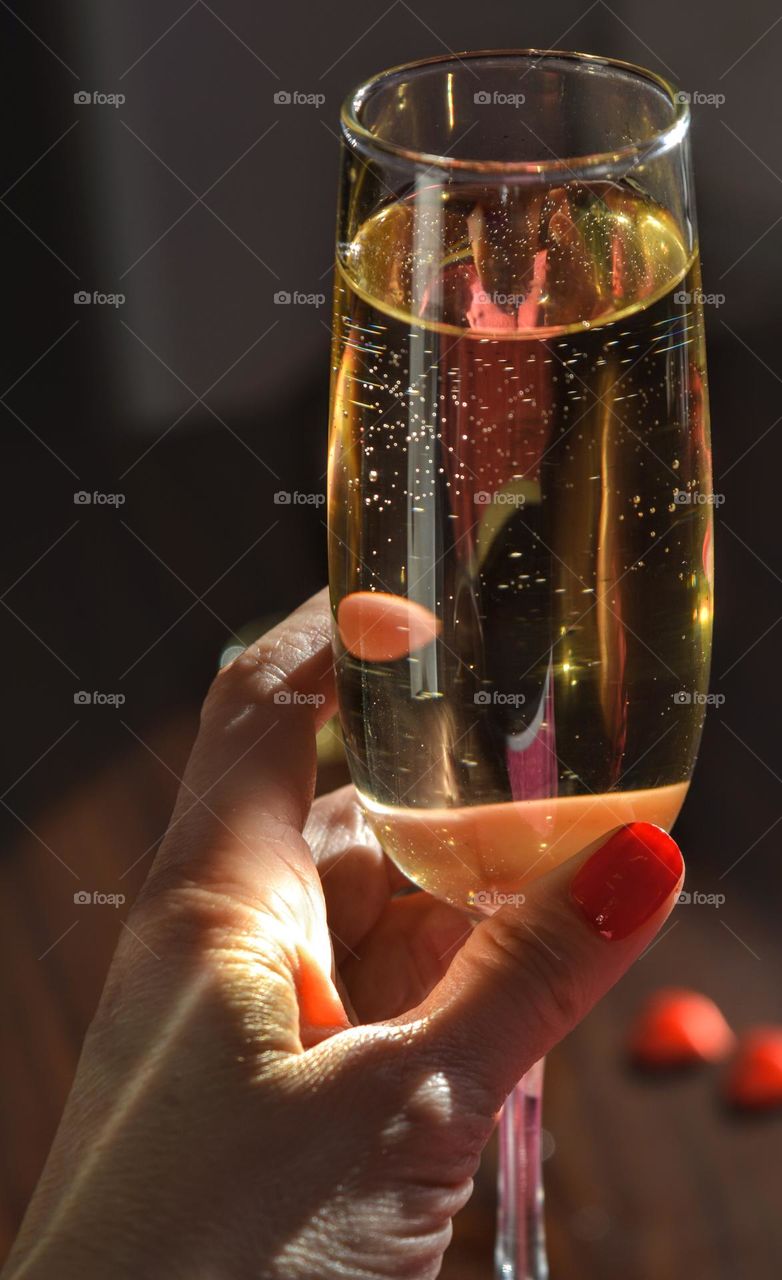 champagne glasses in the hand