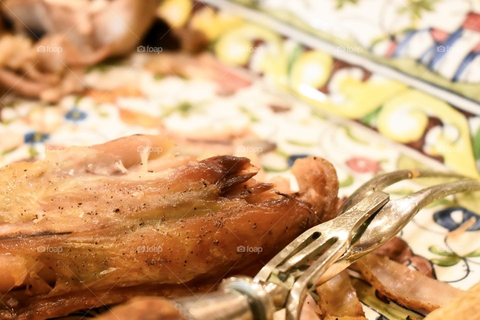 Leftover turkey meat in colorful dish after Thanksgiving holiday feast 