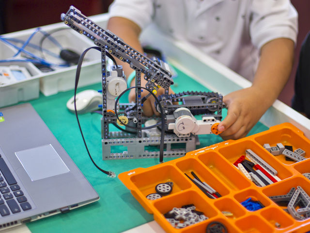 close up of kid experiment about technology