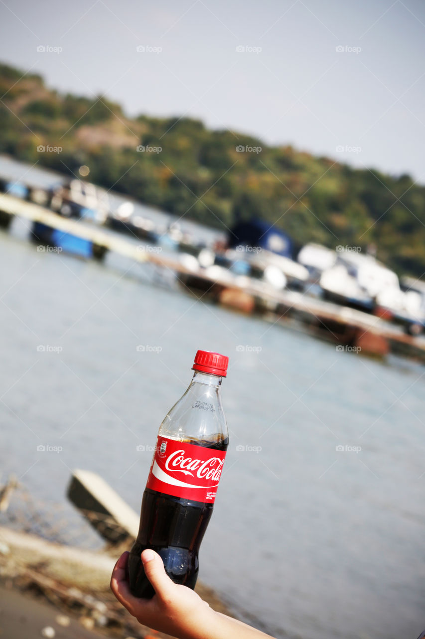 Coca Cola bottle in harbour