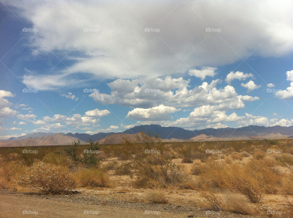 sky blue clouds mountains by sabont