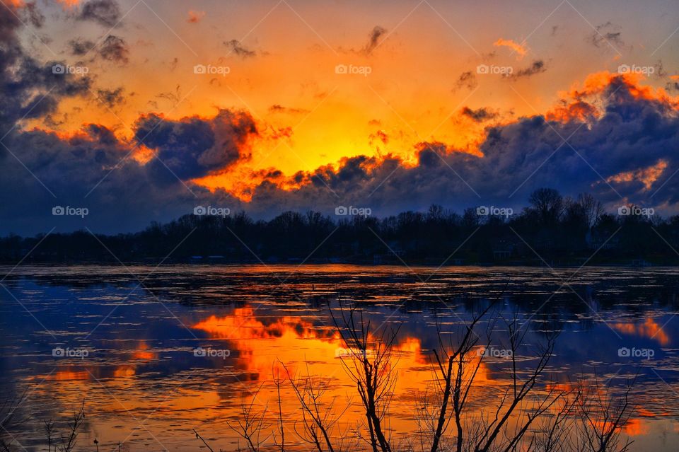 Sunset on the frozen lake in Indiana Indiana frozen lake sunset. 