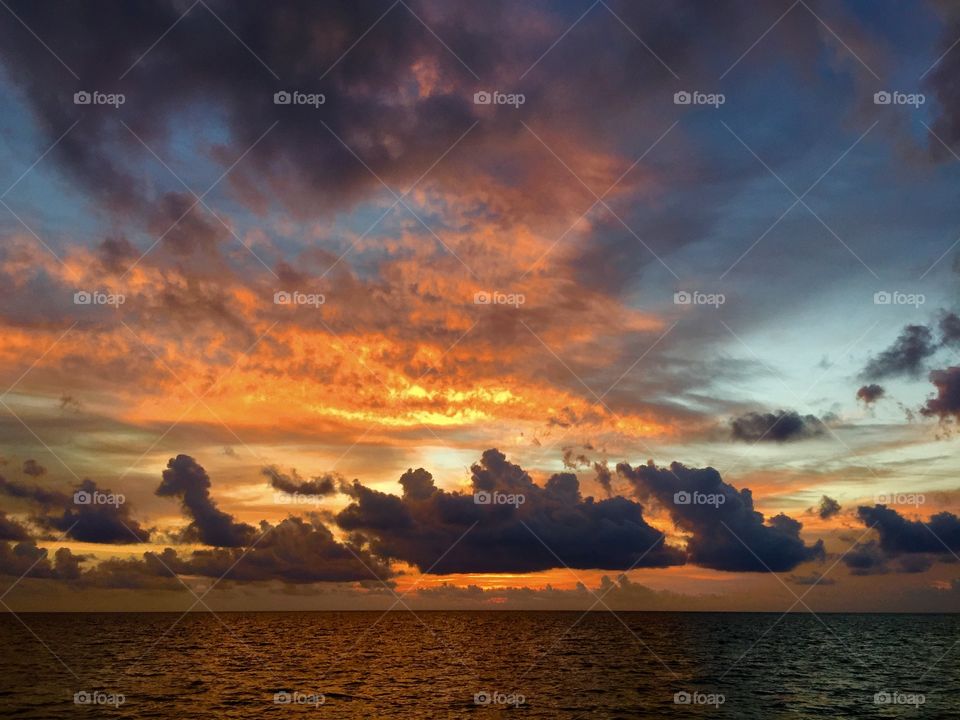 Moody Sky. Dramatic sky at sunrise, Riviera Maya, Mexico