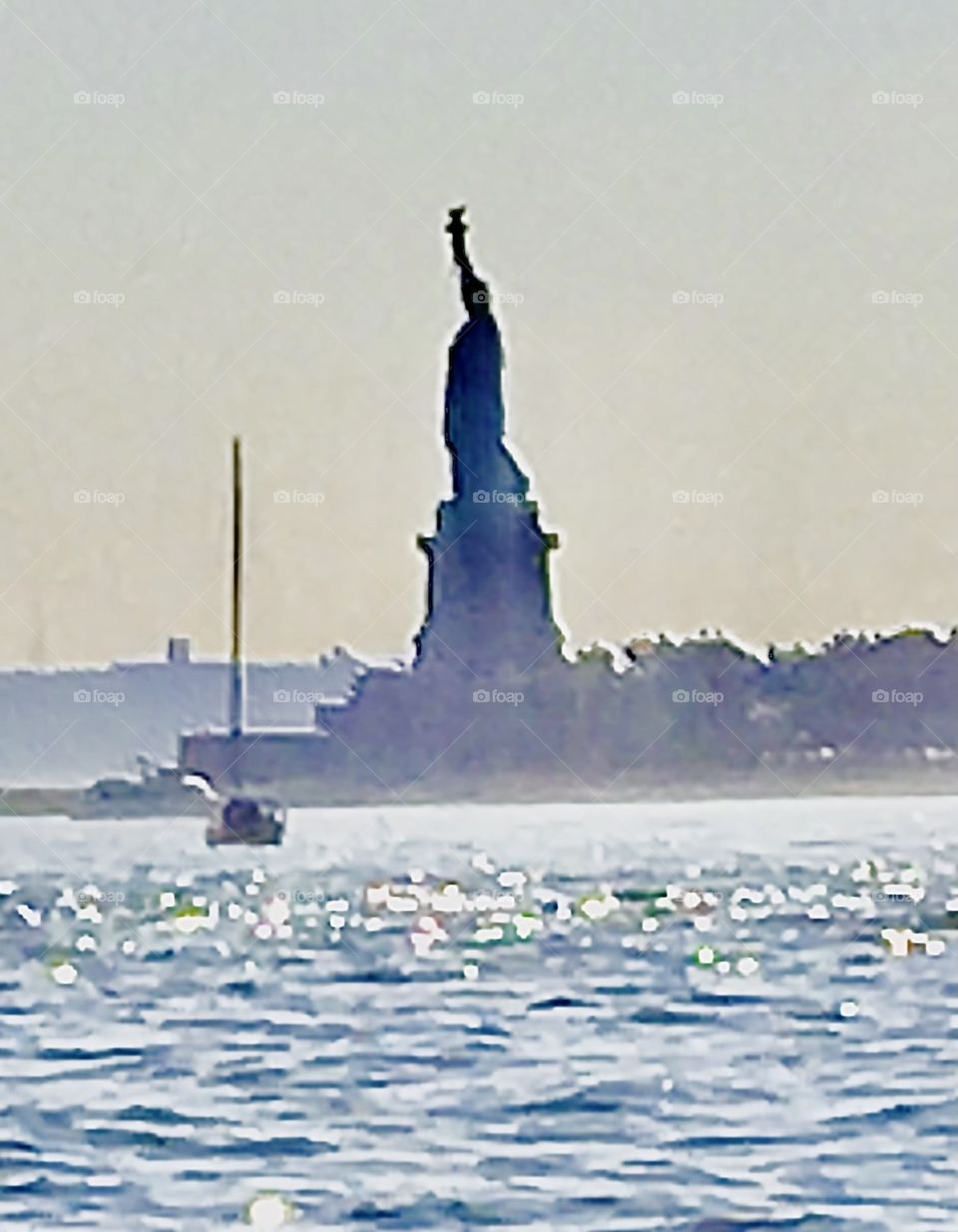 A closeup of the Statue of Liberty we visited by sailboat in the summer of 2018. As you cannot drive up really close to it we had to zoom in on it to get the close view. Hypnotic Productions
