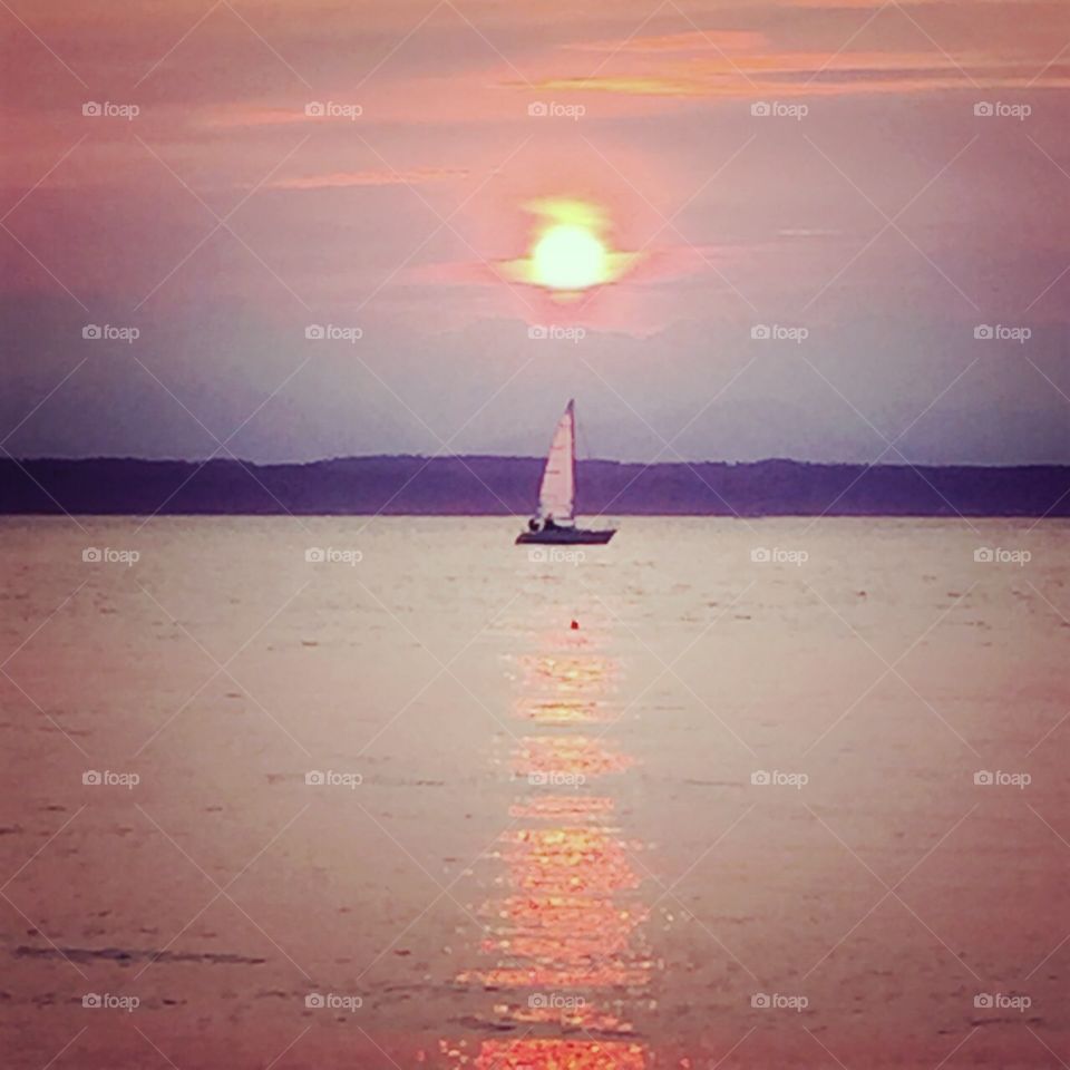 Sunset. Sailboat and sunset