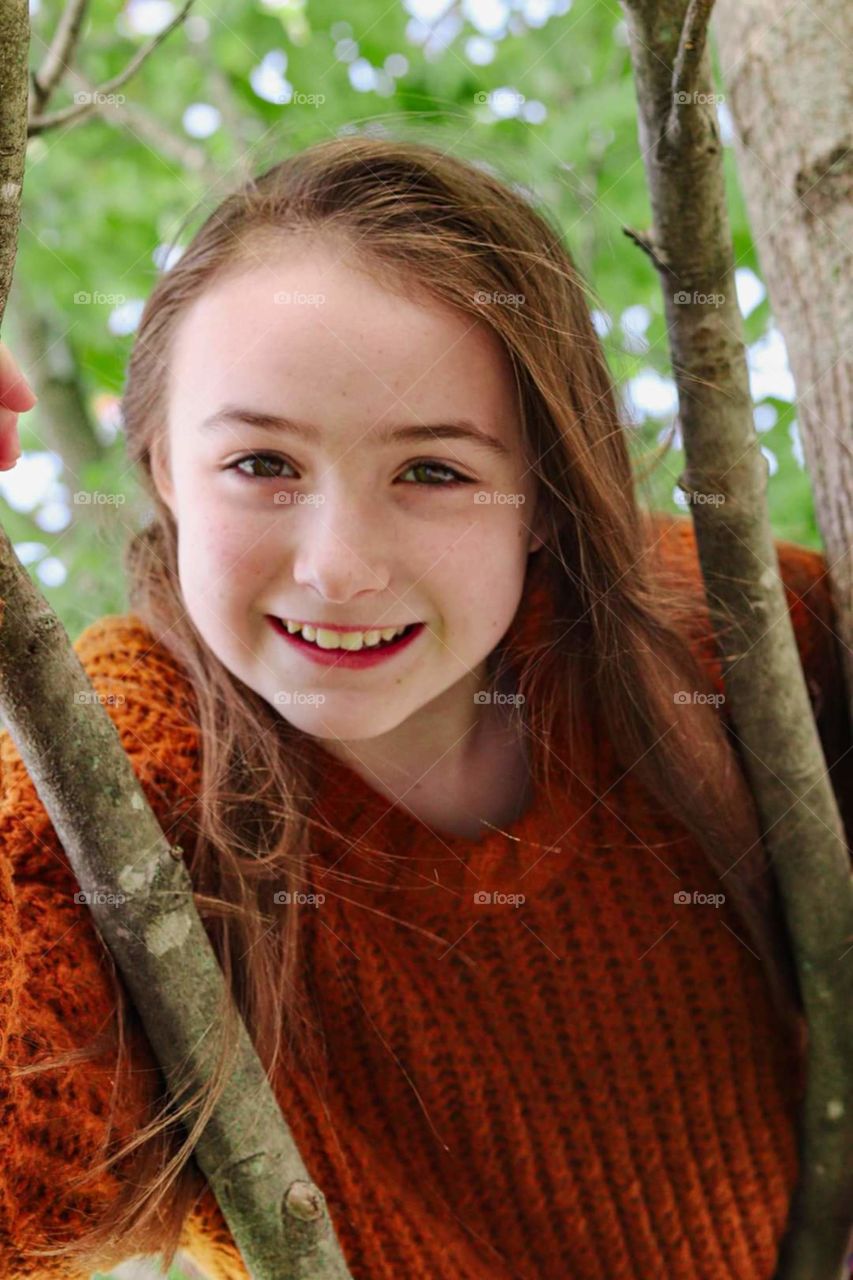 beautiful 11 year old in tree