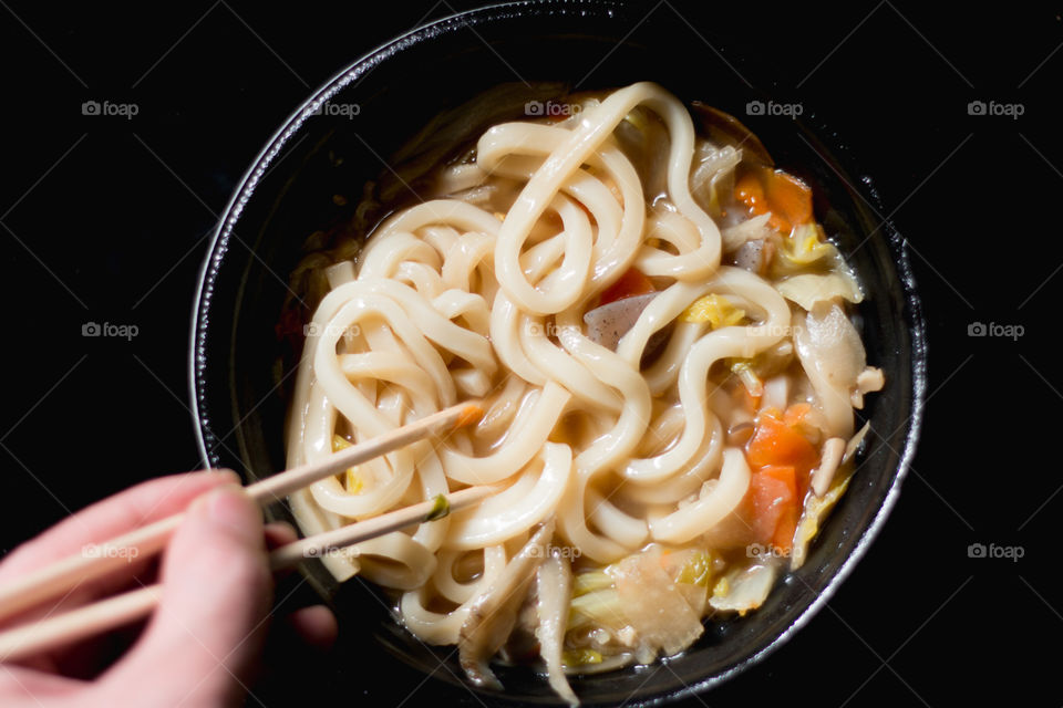 Eating udon noodles.Japan real food/takeaway/cheap food