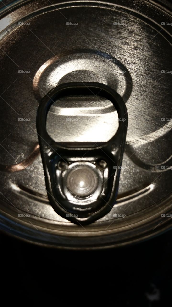 Pull tab on a can of soup.