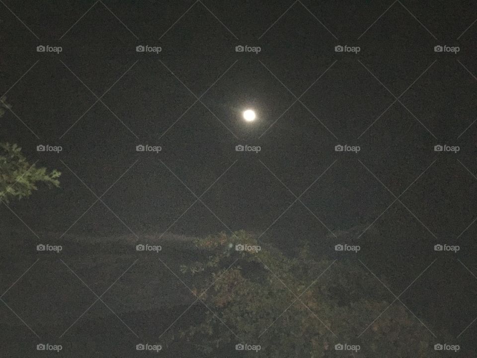 Moon in the night with some clouds