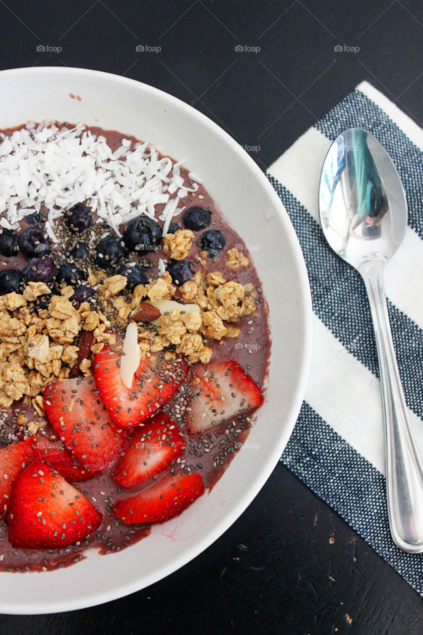 Fresh berries with smoothie in bowl