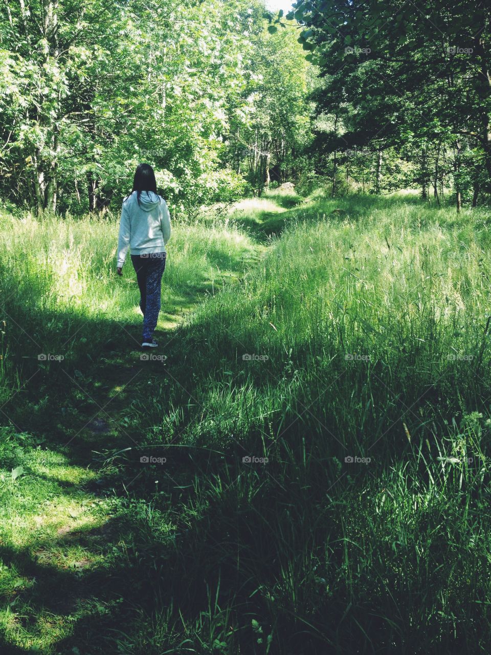 Girl strolling in the woods