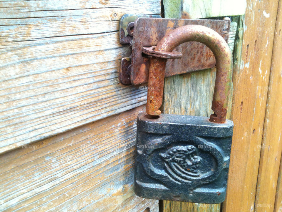 wood metal old padlock by gregmanchester