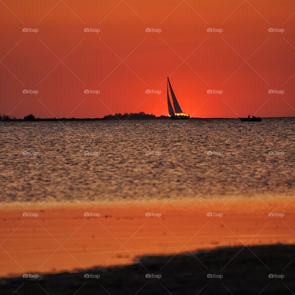 Sailboat in sunset