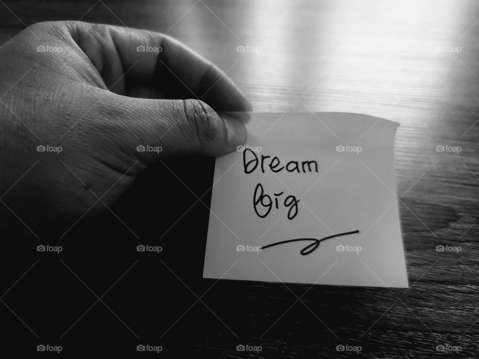 Motivational quotes on a small piece of paper